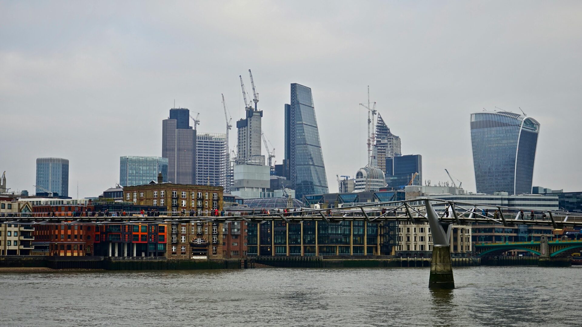 The modern skyline of the City of London, representing corporate excellence.